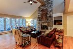 Enjoy relaxing in this spacious family room with enough seating for everyone.